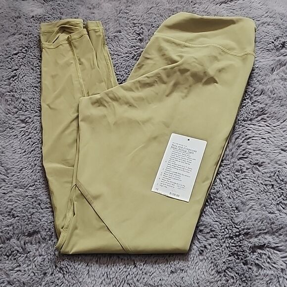 NWT Lululemon Green Nulu and Crisscross Mesh Stirrup Tight Size 12 - Picture 1 of 5